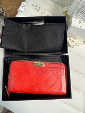 CHANEL Red Quilted Zip Wallet with Gold Plaque